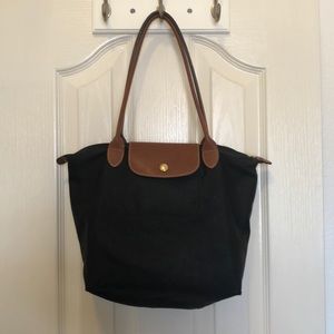 Small, gently used Longchamp “Le Pliage” tote
